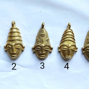 1 African brass pendant, tribal mask (65-68 x 36-37 mm), gold tone