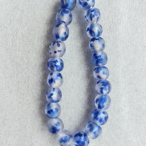 20-23 African recycled glass beads, (14 mm diam.), strand 10 inches, clear glass mottled blue