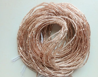 Antique rose color, glossy waist beads, tie on style, strand 42/44 inches, 108/112 cm.