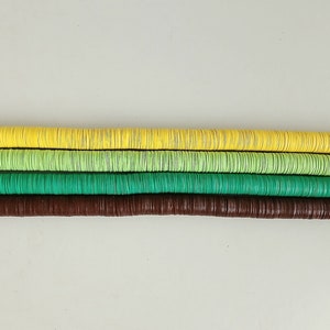 13.5 (0.5581 &quot;)African vulcanite vinyl heishi beads, strand 12 inches (30 cm.), 4 compact colors