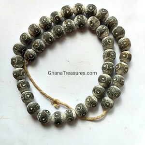 Full string, 40 African clay beads handmade in Burkina Faso, 18-19 x 17-18 mm.