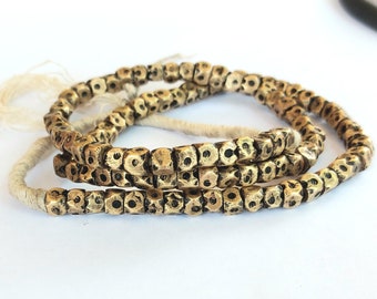 100 brass beads from Mali, gold tone, 24-25 inches strand, cornerless cube spacers, 7 x 6 mm., African trade