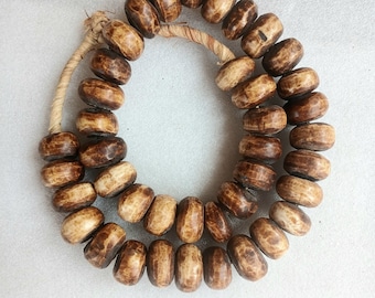 40 cow bone beads, rondelle shaped with wood inlaid, shipped from Spain