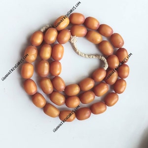 40 African amber oval beads, 17 x 22-23 mm.,  fake amber, synthetic resin beads