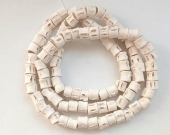 80 cm (32 inches string), 9-10 mm. diameter fish bone rondelle, fish vertebrae #3