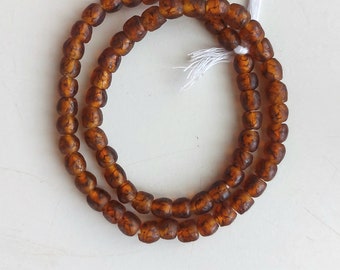 61-63 アフリカ産リサイクルガラスビーズ（7 x 7 mm）、16インチの