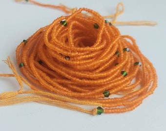 Frosted orange waist beads, tie on style, strand 42/44 inches, 108/112 cm.