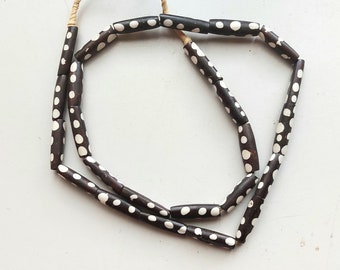 23 Kenya cow bone beads, batik painted, (7-8 mm.diam x 25-27 mm.)