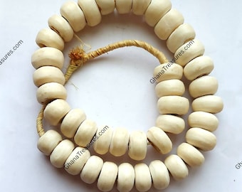 40 Kenya bone beads (25-26 mm.diam.. x 14-15 mm.), shipping from Spain