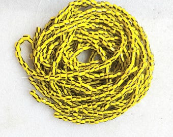 Christmas beads, 6 mm.diameter, strand 32 inches, 80-82 cm., black striped on yellow