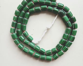 31-32 multilayer Chevron beads, half of the whole strand, 10-11 mm.diam. x 12-13 mm.