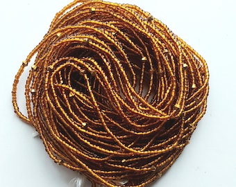 Amber color waist beads, tie on, strand 42/44 inches, 108/112 cm.