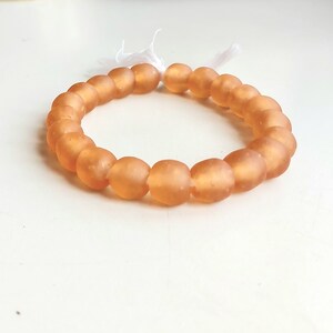 21 African recycled glass beads, (13-14 mm diam.) 10" strand