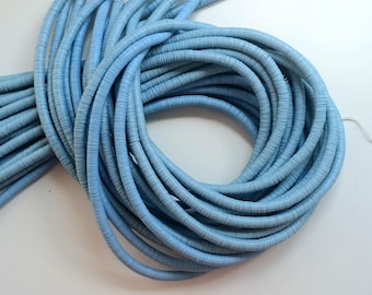 8 mm. Light Blue, African vulcanite vinyl heishi beads, strand 80 cm. (32 inches)