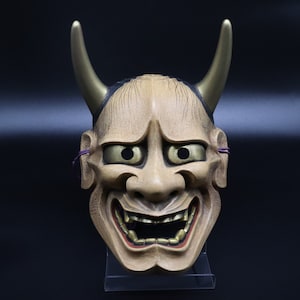 Traditional Japanese Noh mask ”Hannya” Theatre Mask Carved Wood Young Woman Oni Complete with Soft Quilted Pouch Sculptural Wood Grain