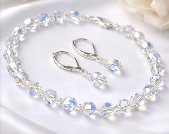 Zestaw biżuterii kryształowej Swarovski, bransoletka i kolczyki w kolorze srebrnym, styl ślubny glamour