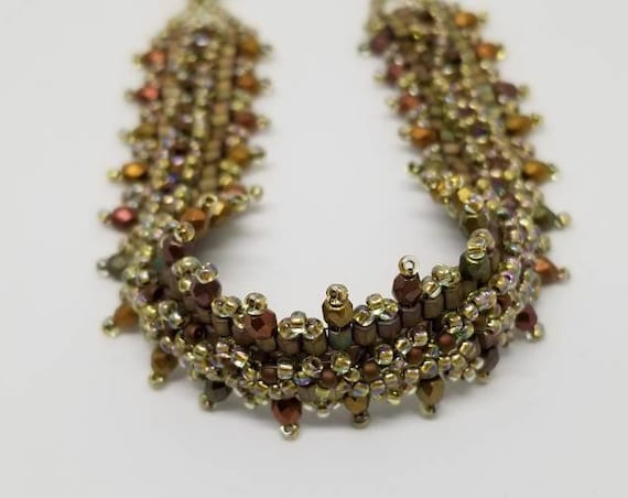 Green and gold beadwork bracelet Rita Caldwell