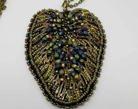 Spring leaf filigree pendant Rita Caldwell Native American inspired