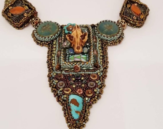 Wolf skulls power statement necklace