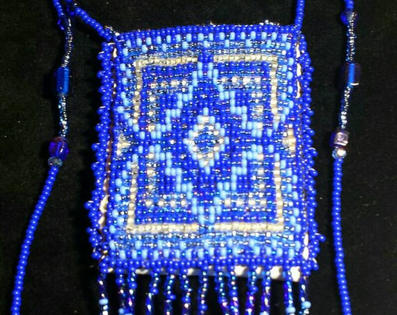 Sky blue waters Amulet Bag. Native American inspired Beadwork Dreams Raven.