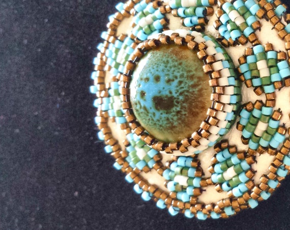 Occhio Beaded southwestern diamond pendant, Native American Inspired beadwork, Native American jewelry. Beadworkdreamsraven