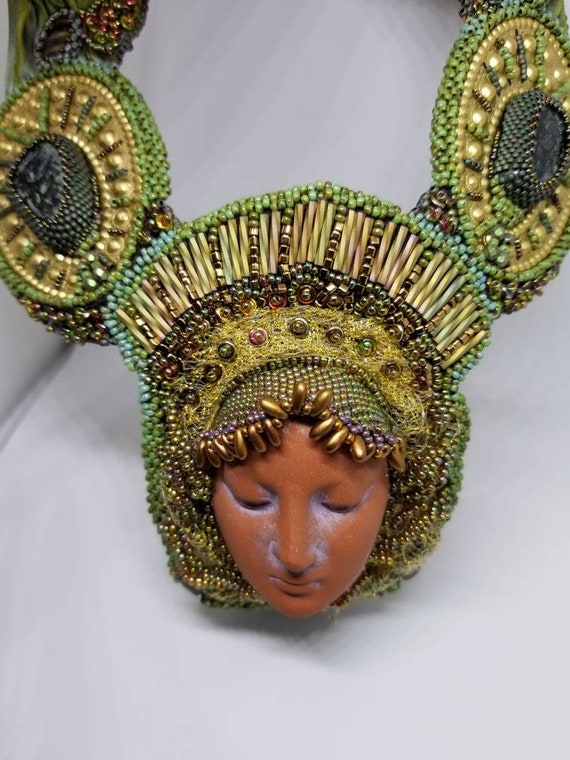Face in time statement necklace Rita Caldwell