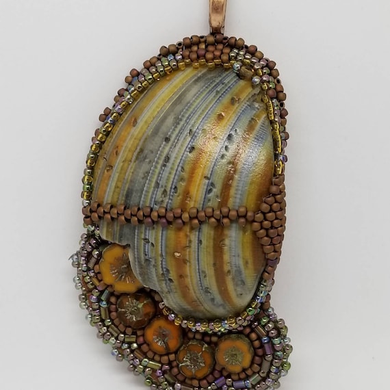 Bronze flowers from the Sea pendant Rita Caldwell Native American inspired beadwork