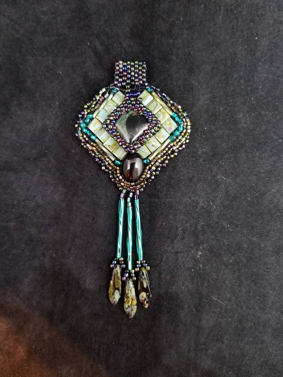 Picasso diamonds and daggers pendant Rita Caldwell