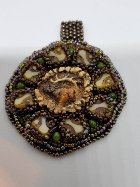 Peaceful Elk pendent Rita Caldwell Native American inspired beadwork