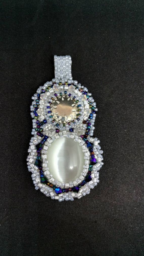 White, silver and blues oh my pendent Rita Caldwell Native American inspired