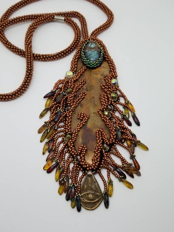 Copper feathers and daggers of glass Native American inspired Rita Caldwell