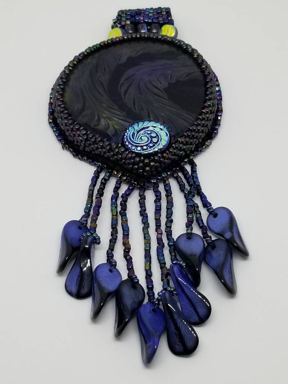 Raven feathers in glass Rita Caldwell Native American inspired