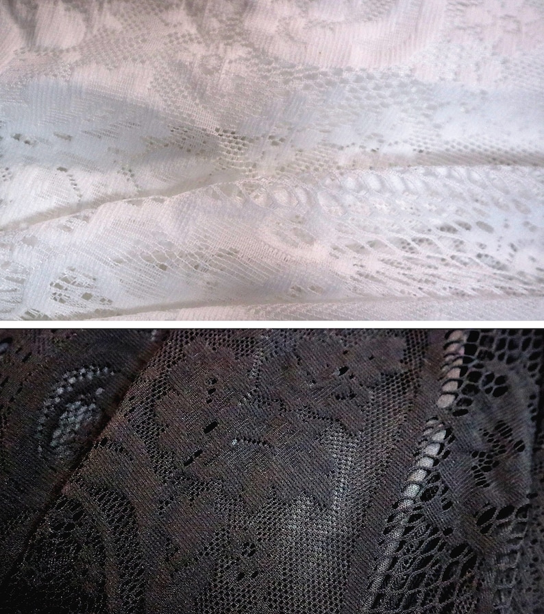 May include: Close-up of two pieces of lace fabric. The top piece is white and the bottom piece is black.