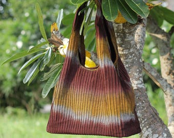 Slouchy hobo-tas van bohokatoen: schoudertas met geplooide textuur, drie vakken