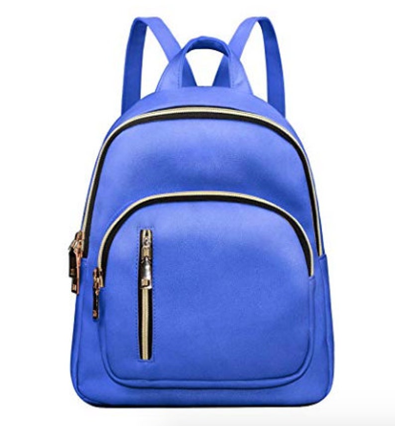 May include: A blue faux leather backpack with gold zipper accents and a front pocket.