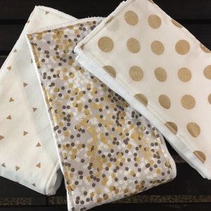 Gold and white baby girl burp cloths in brown, gold, gray, and white with gold glitz