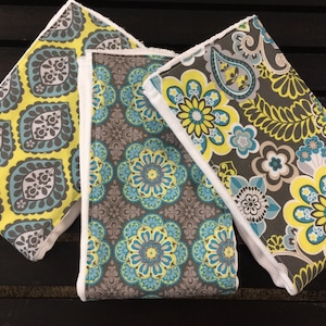 Boho style baby girl burp cloths in turquoise, gray, and yellow flowers