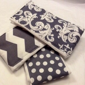 Shabby cottage style burp cloths in gray and white zig zag, floral pattern, and polka dots