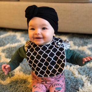 Black design patterned baby girl bib