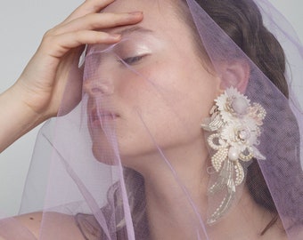 Bridal beaded earrings embelished with flowers, crystals and pearls