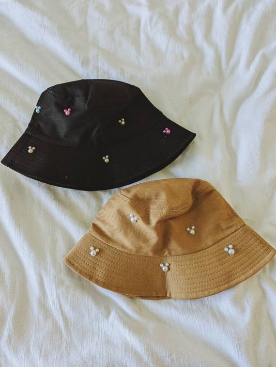 You choose colors! Mickey Pearl Bucket Hat. Brown or Black hat with Rainbow or White Mickeys