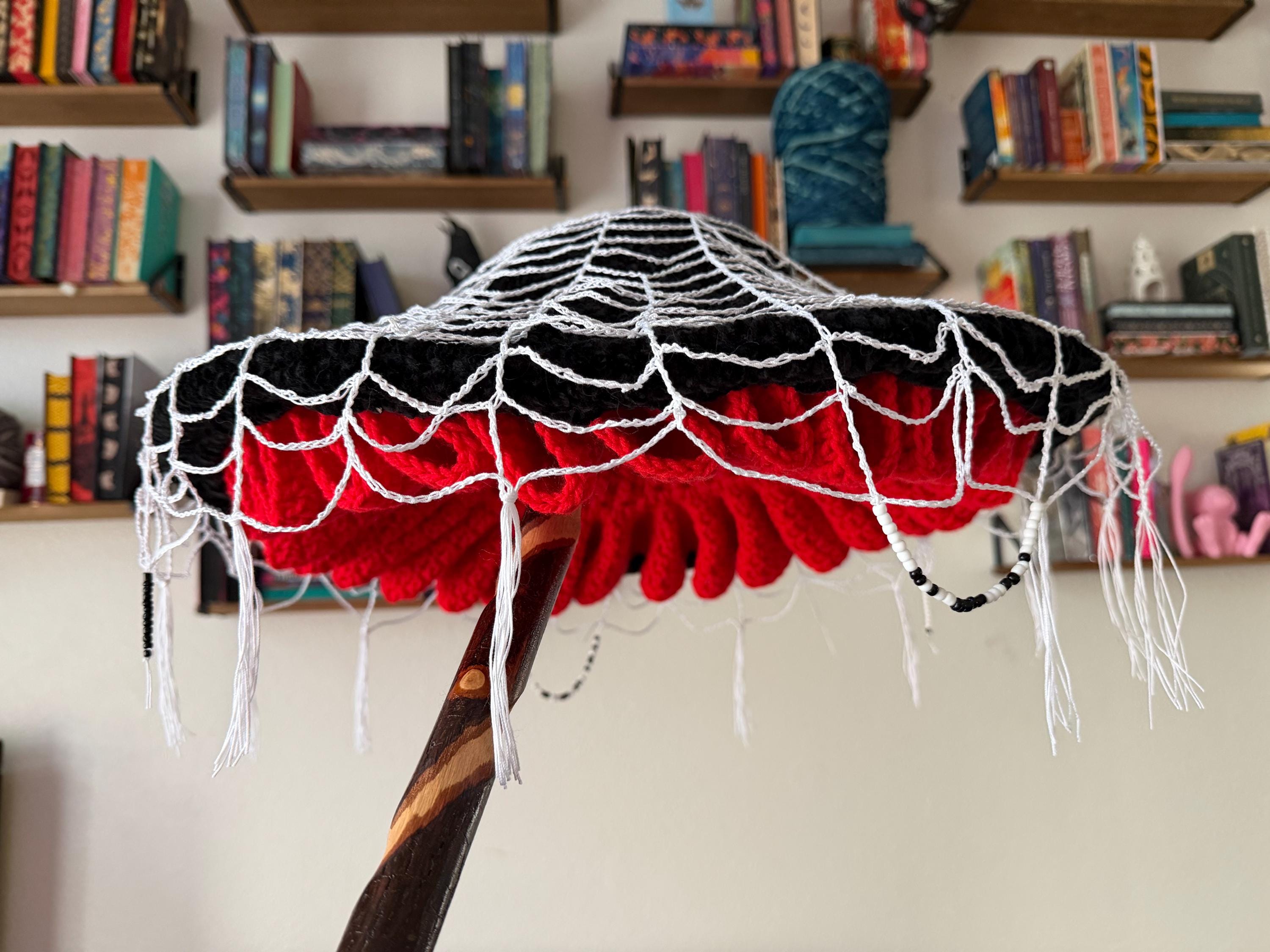 26 Mushroom Hat Crochet Patterns for Cottagecore, Fantasy, and Everyday Wear 23 Giant Crochet Mushroom Hat with Spiderweb and Dangling