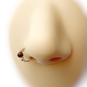 Piercing plaqué or/ oeil de tigre 22G Ø7mm anneau hélix conch narine nostril septum daith rook tragus upper lobe oreille cartilage créole
