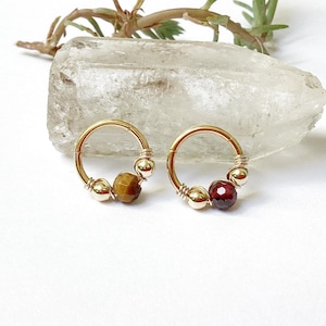 Piercing clicker 16G Ø9 mm occhio di tigre o granato / acciaio ch anello elica conchiglia setto daith rook cartilagine lobo superiore arcade orecchio creolo