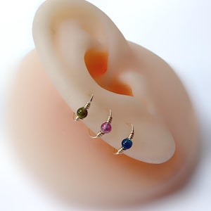 Piercing anneau tourmaline 22G ø7mm sur mesure bague hélix conch nez narine nostril oreille lobe créole rook cartilage tragus minimaliste