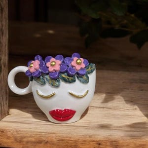 Handmade Ceramic Face Mug: Sculpted Floral Hair, Artistic Espresso Cup