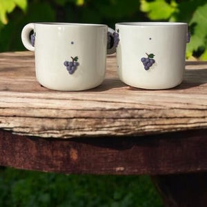 Handmade Ceramic Mug with Grape Motif – Rustic White Clay Coffee Cup – Vineyard Inspired Pottery
