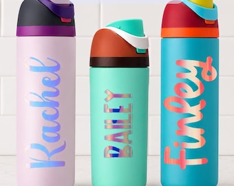 May include: Three water bottles with lids and personalized decals. The left bottle is light purple with the name Rachel. The center bottle is mint green with the name BAILEY. The right bottle is bright blue with the name Finley. Text reads Decal Only.