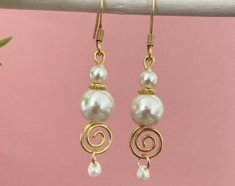 Bijoux mariage boucles d'oreilles Arabesques ivoire et doré