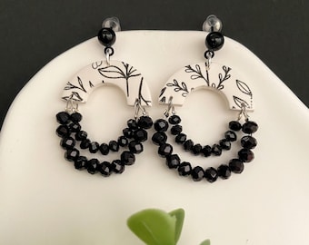 Women's black and white hoop earrings with black pearls, jewelry made in France